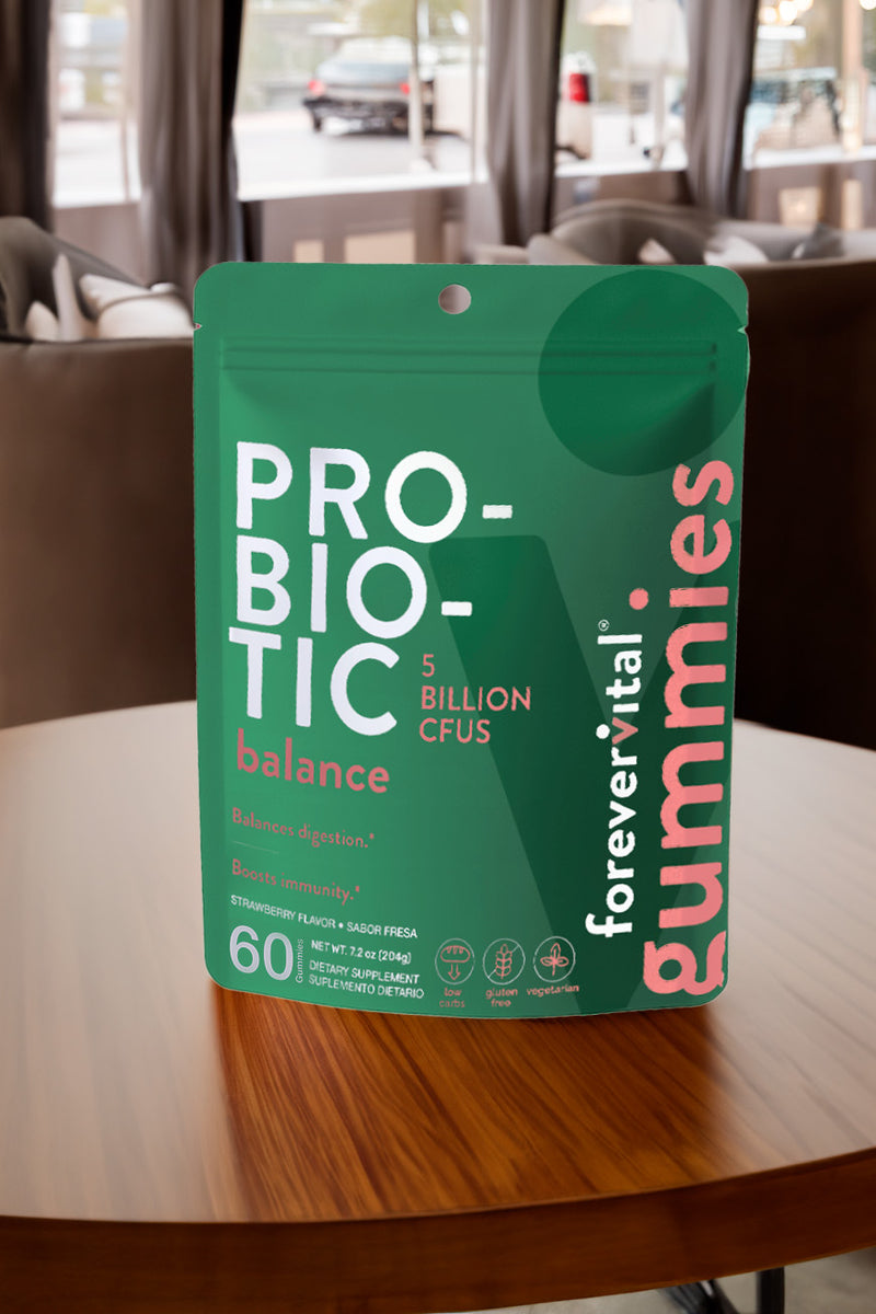 Forevervital Probiotic Gummies pouch displayed on a table, highlighting 5 billion CFUs, strawberry flavor, and digestive health benefits.